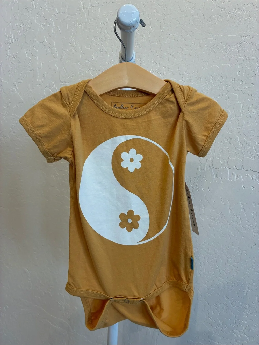 Mustard Yellow Yin Yang Flower Baby Bodysuit